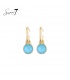 Oorbellen met blauwe ronde steen en goudkleurige ring