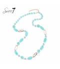 Halsketting met turquoise kralen en goudkleurige schakels