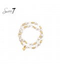 Armband witte parels met goudkleurige en heldere kralen