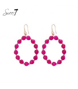 Oorbellen met fuchsia roze kralencirkel en goudkleurige details