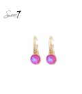 Oorbellen goudkleurig met ronde roze kristalhanger