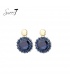 Oorbellen blauw met een ronde hanger, kralenrand en goudkleurige knop