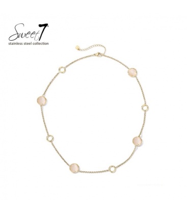 Halsketting met beige cat eye stenen en goudkleurige cirkels